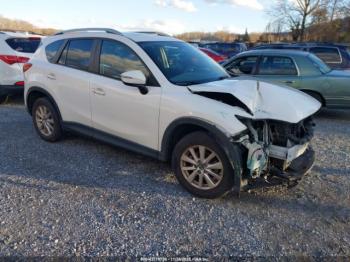  Salvage Mazda Cx